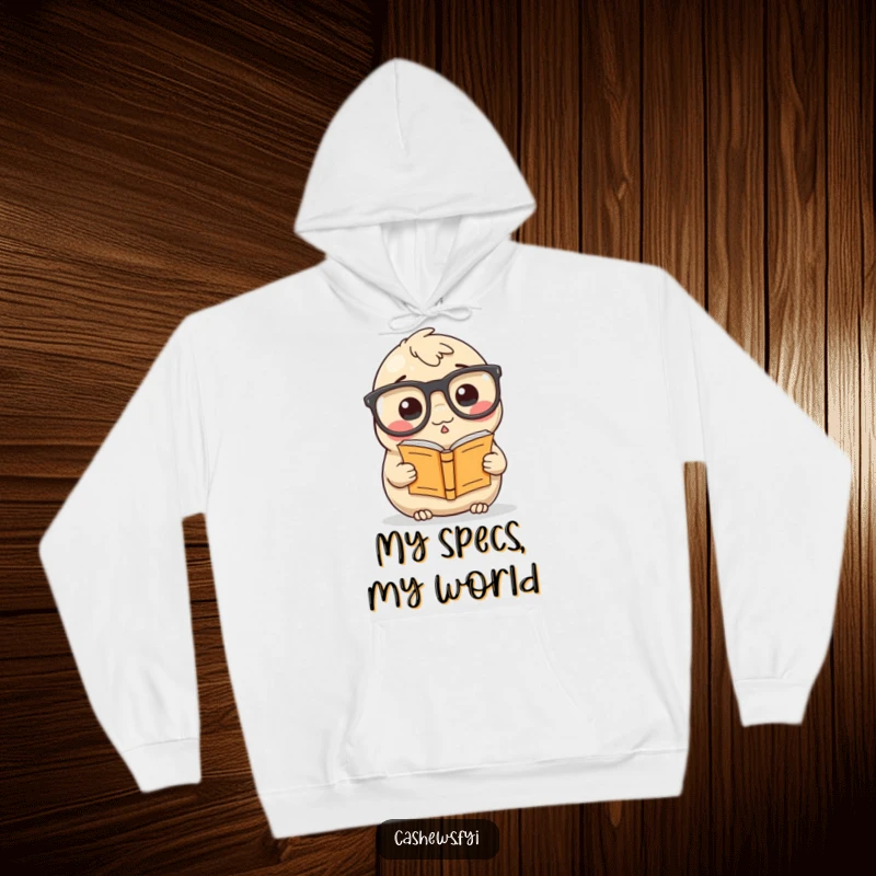 Funny Hoodie: A cashew with enormous glasses reads a miniature book, a warm and humorous addition to any wardrobe.