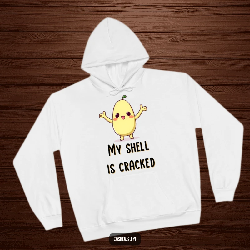 Funny hoodie featuring a kawaii cashew character with arms raised in a cute pose of surprised delight, offering warmth and charm.