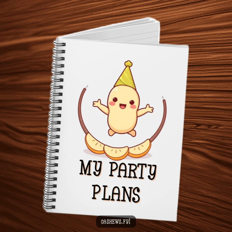 Funny cashew party notebook featuring a cheerful cashew character with a party hat, jumping through a hoop of cashew halves, great for notes.