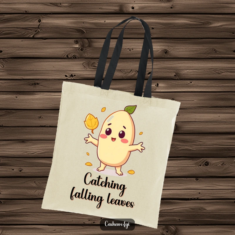 Funny tote bag featuring a kawaii cashew character with arms outstretched, surprised by a falling leaf, ideal for carrying surprises.