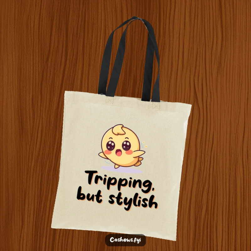 Funny tote bag featuring a cashew character tripping slightly but landing gracefully with a surprised, wide-eyed expression, perfect for everyday use.